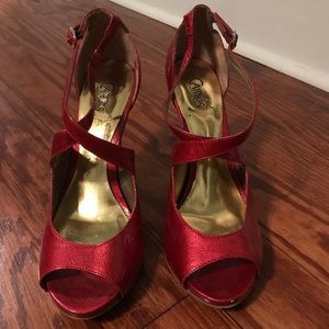 Carlos Santana red, patent leather shoes